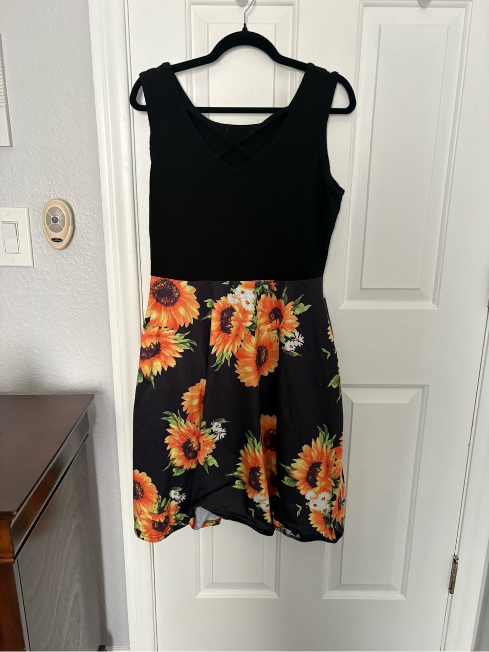 Sleeveless Black Dress with Sunflower Print Skirt